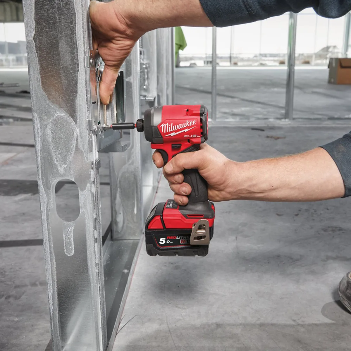 Milwaukee M18FID3100P-502P 18V FUEL Brushless 1/4 Impact Driver with 2 x 5.0Ah Batteries. Charger. Packout Case & Accessories Set