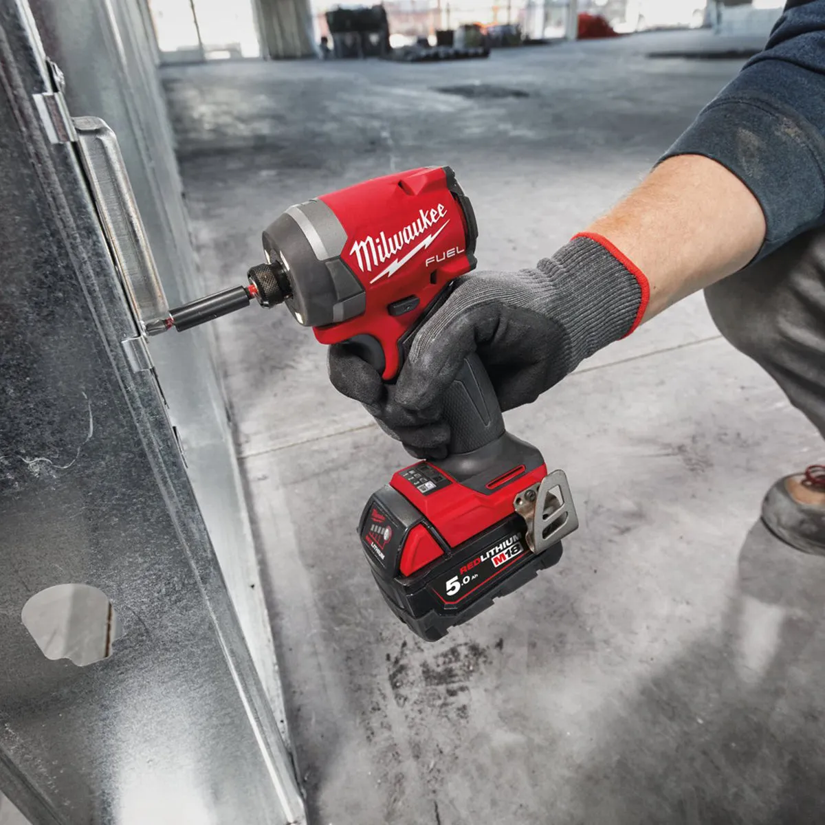 Milwaukee M18FID3100P-502P 18V FUEL Brushless 1/4 Impact Driver with 2 x 5.0Ah Batteries. Charger. Packout Case & Accessories Set